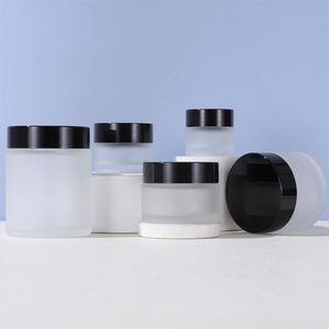 Frosted glazen crème flessen flessen crème potten lege cosmetische verpakkingscontainers met zwarte plastic dop