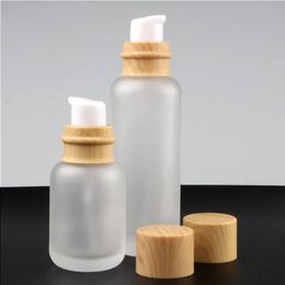 Frascos de creme de vidro fosco redondos frascos cosméticos mão garrafa de bomba de loção facial com tampa de grão de madeira Lgeoj