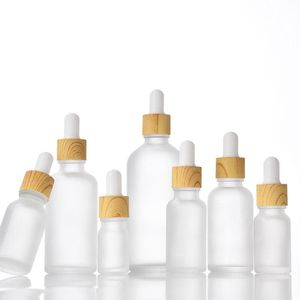 Bouteilles de parfum d'huiles essentielles en verre givré avec capuchon en grain de bois Pipette de réactif Pipette compte-gouttes Aromathérapie Conteneurs liquides 10 ml 30 ml 50 Fihd