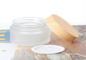 Grosses pots en verre 50g 60g 80g Pot de crème pour le visage avec imitation en bois Joint de protecteur de protecteur