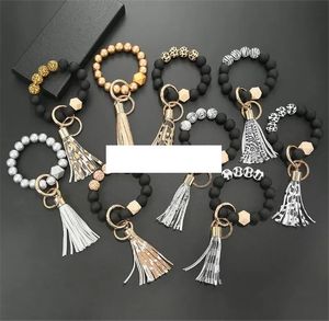 Bracelet de perles en bois givré porte-clés motif de mode gland pendentif Bracelets femmes fille porte-clés dragonne