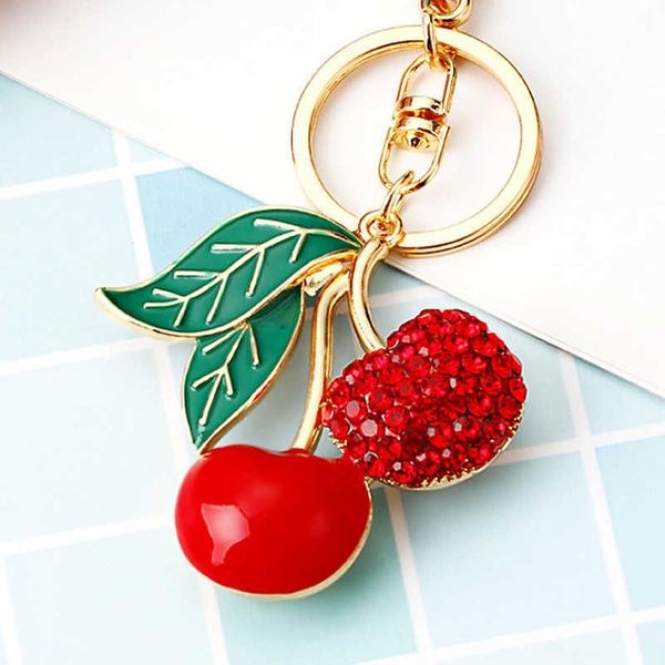 Fruit Little Car Keychain Keethain's Femme Creative Package Créatif Accessoires suspendues Metal Ring Gift