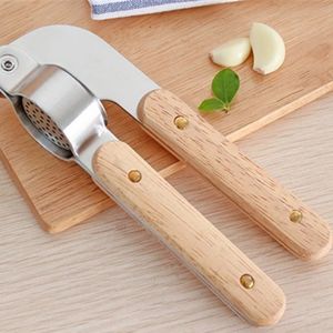 Fruitgroentegereedschap houten handvat handmatige knoflook persroestvrij staal 304 masher peeler creatieve keukengadgets