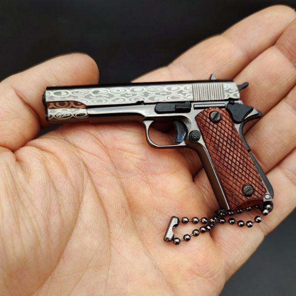 Serie completa Pistola de metal Juguetes Modelo de pistola de alta simulación Desmontable G17 M1911 Desert Eagle M92F Armas de aleación ensamblables gratis Llavero Regalo para niños adultos 001