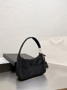 Sacs de concepteur fonctionnel Forfait Sac à bandoulière Femme Classic Mode élégante Classic Femmes de luxe Femmes de Cowhide Couleur Brand Axillaire Sacs à main 202