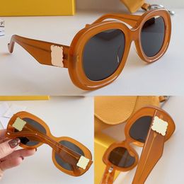Funky zwarte zonnebril 40103 heren dames ovaal concaaf-convex stereoscopisch frame mode klassieke trend merkbril dames zonnebril met doos LW40103