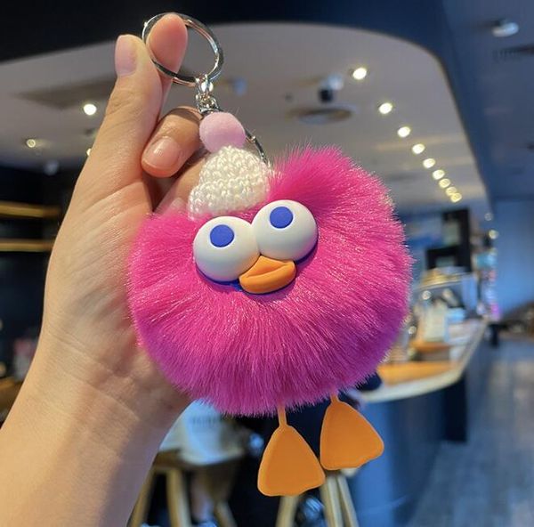 Poste de llaves de peluche de chicas divertidas con chaleco de llave de peluche de encanto de pompo