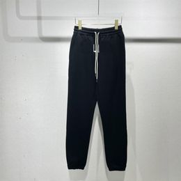 fw nieuwste broek met letterprint zwarte fleece topkwaliteit katoenen lange broek heren dames pant257U