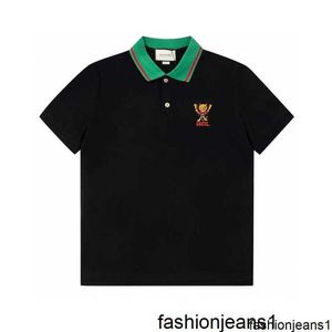 La famille G a vérifié la version correcte du revers d'été à manches courtes avec un polo brodé à petit motif de tigre pour garçons, t-shirt noir {catégorie}