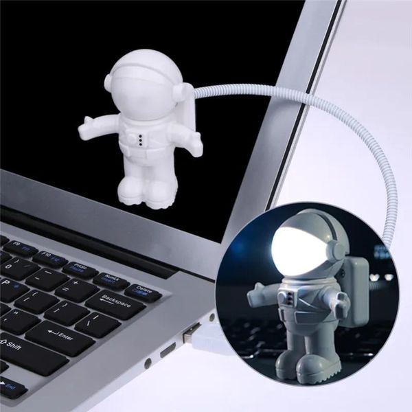 Gadget nuevo astronauta astronauta USB LED luz nocturna ajustable dispositivos USB para ordenador PC lámpara al mejor precio