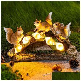 Tuindecoraties beelden squirrel met zonne -aangedreven lichten buiten voor patio gazon werf huiswarming hars vorm art druppel d dhtku