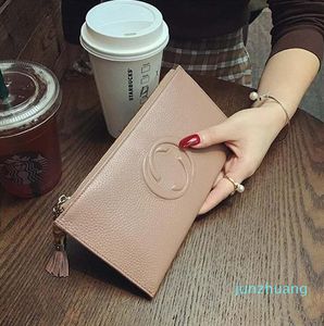 Echte koesleer Zipper Tassel Dames Designer Wallets Super Dunne Lady Fashion 2323 Zero Portemones vrouwelijke populaire telefoonkoppels No66