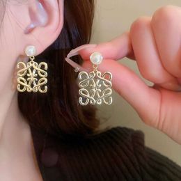 Echt gouden gegalvaniseerde siernaaldparel, antiek metalen lijn Koreaans temperament, hoogwaardige Sense-oorbellen en oorbellen