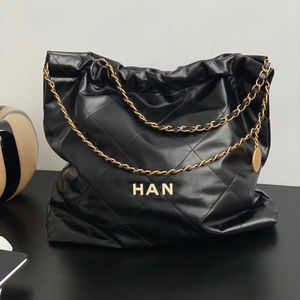 Designers en cuir véritable voyagent grand sac fourre-tout 2022 Cross Body hangbag sac à main Luxurys Portefeuilles Hobo clochard Épaule Décoration en métal femmes homme Embrayage week-end sacs