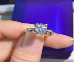 Geoki 925 sterling zilver Perfect Cut 1ctPassed Diamond Test Moissanite Ring VVS1 Uitstekende kwaliteit Gem Trouwringen Dames T2009085222323