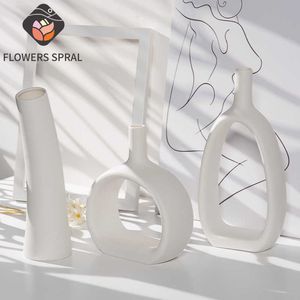 Géométrique creux nordique Vase blanc en céramique artiste maison salon Table à manger bibliothèque décoration cadeau créatif 210623