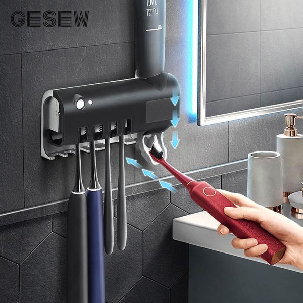 GESEW Esterilizador UV Soporte para cepillo de dientes Energía solar Exprimidores automáticos de pasta de dientes Dispensador Accesorios de baño montados en la pared T200624