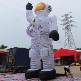 Ballon d'air de dessin animé d'astronaute gonflable géant avec lumière LED à vendre