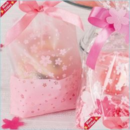 Geschenkomschakeling 100 stcs 16x26cm roze kersenbloesem afdrukken Transparante cadeauverpakkingszakken Plastic tas voor snoep en snoep Christmas wra dhaox