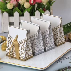 Gift Wrap 100pcslot product Europese stijl bruiloft geschenkdoos Gouden Zilver Golvend Patroon Bonbondoos met Lint Feestartikelen 230625