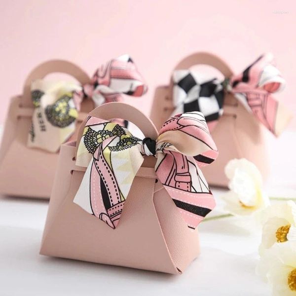 Regalos de regalos 10pcs Distribuya bolsos de cuero rosa Bolso de boda Bolso para invitado Mini bolso con la caja de carcasas Decoración de la fiesta