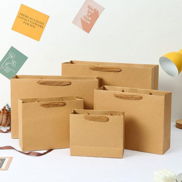 Cadeau cadeau 10pcs sac simple emballage vêtements fourre-tout portable papier kraft à la main