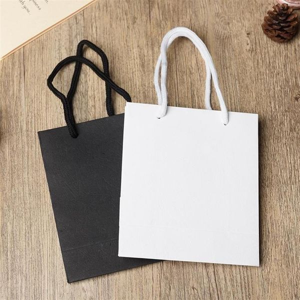 Cadeau cadeau 10pcs blanc noir sac de papier simple de haute qualité avec poignées kraft boîte de bonbons fête de mariage package2200