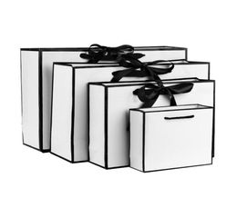 Enveloppe-cadeau 10pcs Sac en papier kraft blanc avec poignées vêtements shopping grande fête de rangement Favoule Candy Emballage Bow8569992