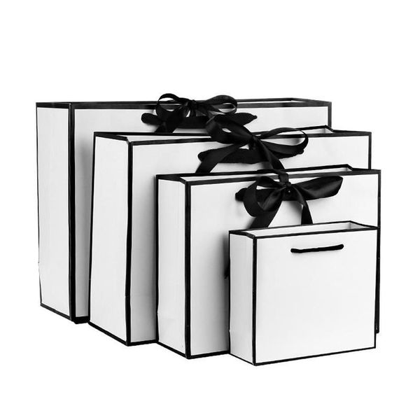 Cadeau cadeau 10pcs sac en papier kraft blanc avec poignées vêtements shopping grande fête de stockage faveur emballage de bonbons Bow264g