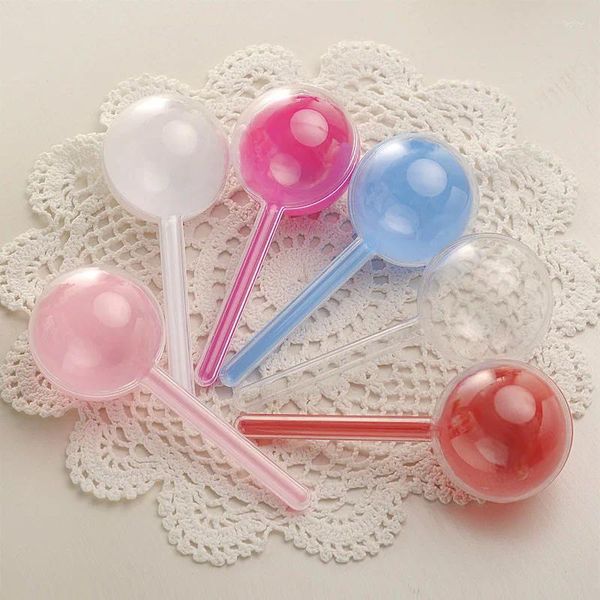 Envoltura de regalo 12 unids / set Caja de dulces de plástico de dibujos animados Mini Lollipop Diseño Colorido Titulares de bolas lindos Favores de fiesta de cumpleaños del bebé creativo
