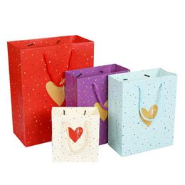 Cadeau cadeau 15 7cm 20pcs / lot sac en papier imprimé coeur avec poignée fête grands sacs pour cadeaux de mariage cadeau