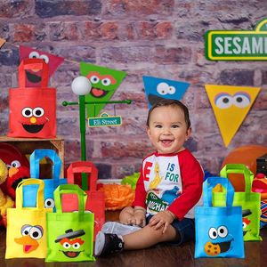 Geschenkwikkeling 20 -stcs/set sesam niet geweven stof tas elmo koekje themafeest decor verjaardag decoratie schattige kleurrijke opslag benodigdheden voor kinderengif