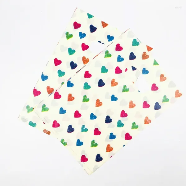 Envoltura de regalo 20x30 cm Corazón colorido Embalaje de plástico pequeño bolsas amarillas con mango de joyería Boda 50 piezas