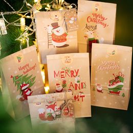 Geschenkomschakeling 24 -stcs/sets Geschenktassen Kerstmis Kraft Paper Santa Claus Sneeuwman Holiday Kerstmis feestje Pouch Wikkel Supplies Candy Cookie Packaging 230316