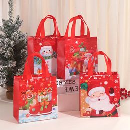 Cadeau cadeau 4pcs joyeux sacs de Noël avec poignée tissus non tissés père Noël bonhomme de neige bonbons collations pochette d'emballage fête déco 231017