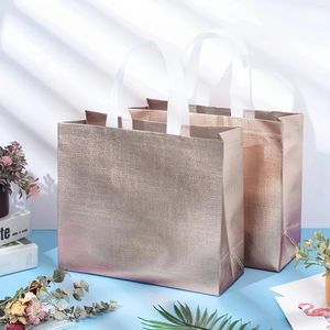 Emballage cadeau 4pcs Sac laser non tissé en or rose pour sacs à provisions de vêtements de fête
