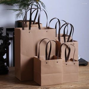 Cadeau cadeau 500pcs / lot personnalisé épaissi fond carré sac en papier kraft pour faire du shopping emballage de fruits portable floraison