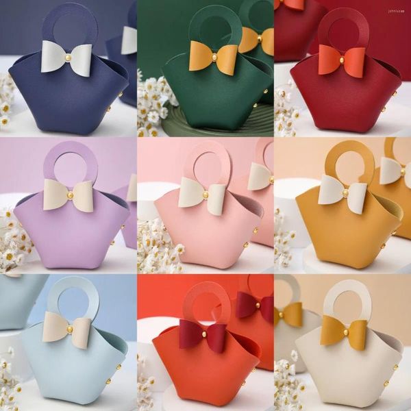 Cadeau cadeau 50pcs Pâques mini sacs en cuir sac à main boîte à bonbons avec arc pour sac de faveur de mariage distributions d'invités décor de fête