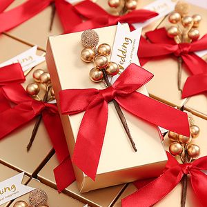 Cadeau cadeau 50pcs européen bowknot bonbons boîtes faveur cadeau doux doré boîtes à main emballage sac boîtes bébé douche fête de mariage décoration 230316