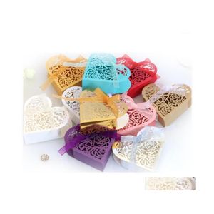 Emballage cadeau 50pcs support de boîte à bonbons en forme de coeur creux avec noeud de ruban pour emballage de fête de mariage chocolat Decora L11 Drop Delivery H Dhauk