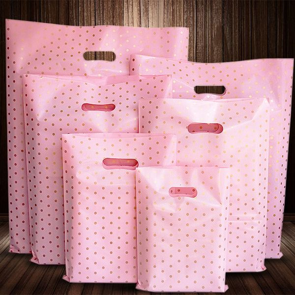 Papel de regalo 50 Uds. Bolsas con asa de plástico con puntos de oro rosa, embalaje de ropa con asas, bolsa de compras 221202