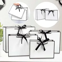 Cadeau cadeau 5pcs portable centre commercial sac de papier sac à main blanc arc ruban cadeaux sacs d'emballage vêtements bijoux boîtes d'emballage pour le mariage