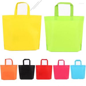 Cadeau cadeau personnalisé imprimé logo bonbons couleur sac de fête non tissé goody emballage fond traiter pour Noël enfants anniversaire événement faveur