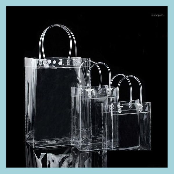 Emballage Cadeau Emballage Cadeau 10 Pcs Pvc Sacs En Plastique Avec Poignées Emballage De Vin Clair Sac À Main Party Favors Sac Mode Pp Button1 Drop Delive Dhvu6