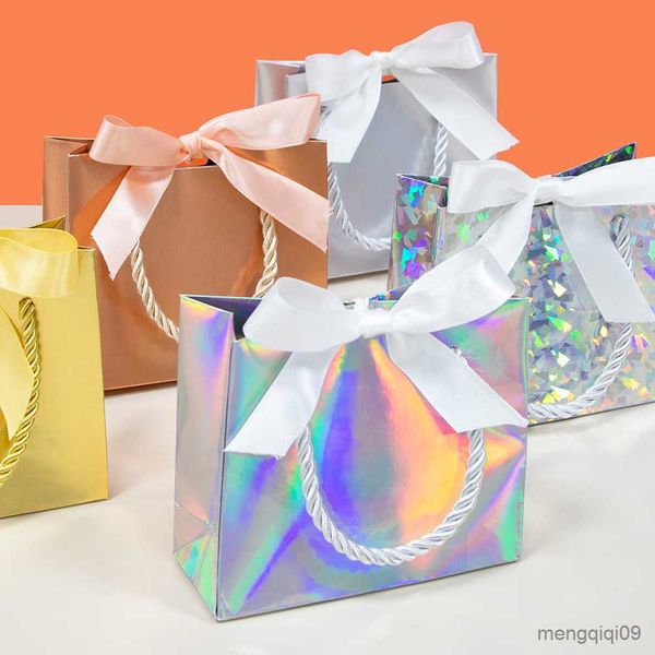 Bolsa de papel láser de regalos bolsas de papel de regalo de oro.