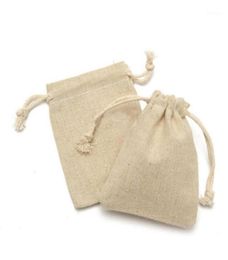 Paquete de envoltura de regalo Lote de lino de algodón Pequeña bolsa natural Bolsa con cordón para regalos de joyería de caramelo Saco de yute de arpillera con cordón 15528981