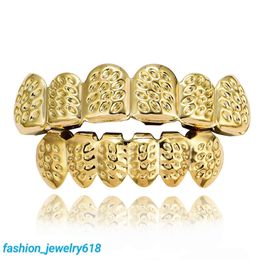 Tirantes de hip-hop con patrón tallado dorado Tirantes decorativos HIPHOP que marcan tendencia Teeth Grillz