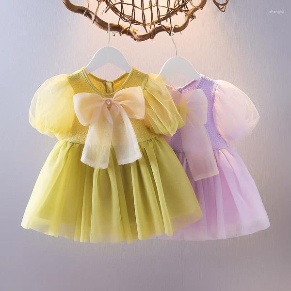 Robes de fille 2024 vêtements de bébé couleur de couleur une décoration de fleur d'arc