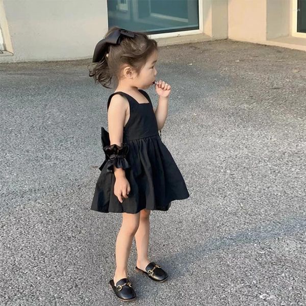 Vestidos de niña, moda coreana para niñas, vestido negro con lazo en la espalda abierta, ropa informal pequeña de verano 2024 con tirantes de Color sólido, ropa dulce para niños