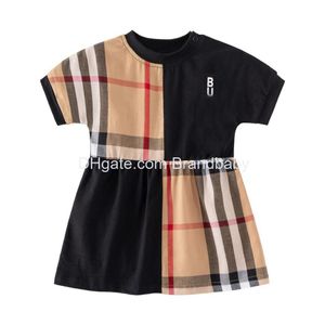 Robes de fille 2023 Vêtements pour tout-petits Bébé Fille Chemise à carreaux Robe d'été pour enfants Jupe en coton à manches courtes Classique Revers Importé C Dh3Zw